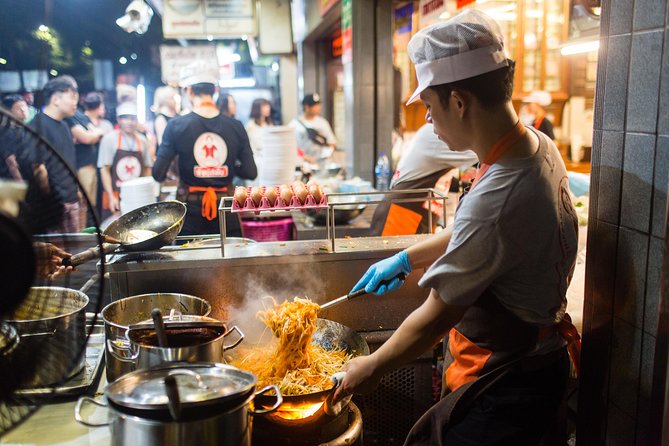 Bangkok by Night: Temples, Markets and Food Tuk-Tuk Tour - Dinner at a Bangkok restaurant