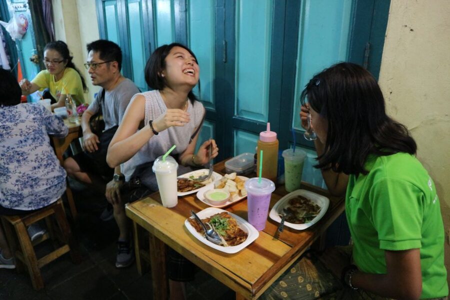 Bangkok: E-Scooter Night Tour with Local Street Food - Crossing the Chao Phraya by local ferry