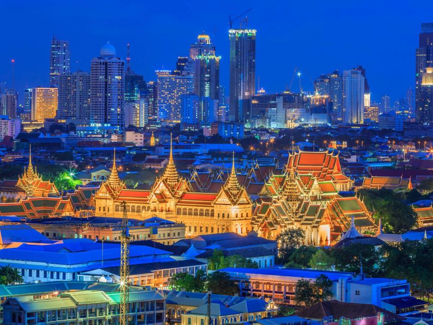 Bangkok: Evening Tour with Wat Arun, Wat Pho & Tuk Tuk Ride - The ferry across the river to Wat Arun