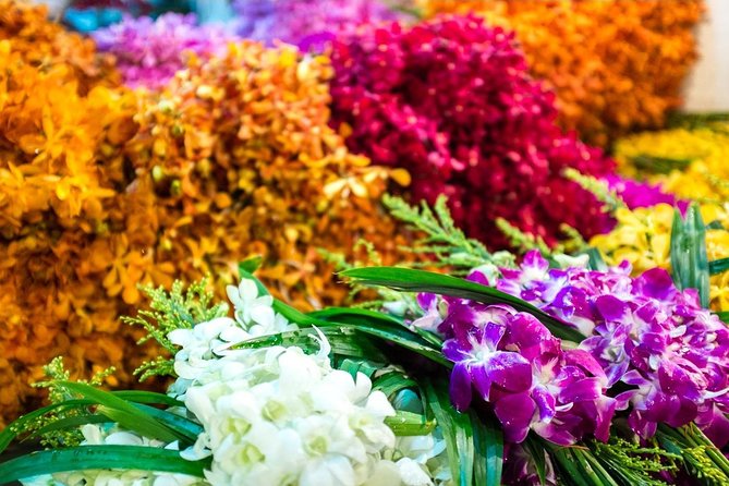 Bangkok: Night Bike Tour with Temples & Flower Market Visit - Wat Rakang and the riverside view of Wat Arun