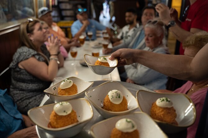 Barcelona Old Town Tapas Tour: Vermouth, Bites & Hidden Gems - City Hall, a local sweet, and the Barcelona Cathedral