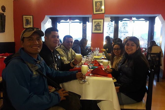 Cusco by Night: Planetarium Cusco, Dinner, and Pisco Sour - A Pisco Sour with a city view