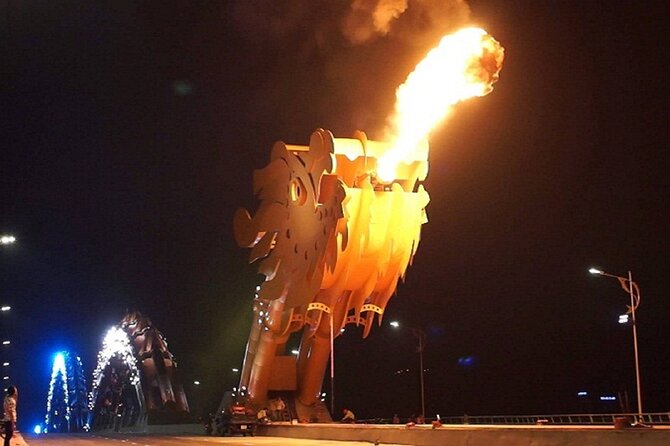 DaNang Night Foodie Tour-Sighseeing with Aodai Lady Rider Private - Crossing Dragon Bridge after dark