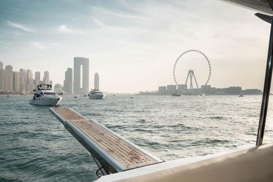 Dubai: Sunset & Night Cruise with Bites and Drinks - Included drinks and the real value of $67
