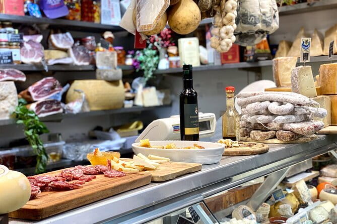 Florence Evening Food Tour with Florentine Steak & Tuscan Wine - Handmade raviolo and wine make a brief third tasting