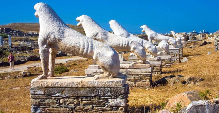 From Mykonos: Delos Archaeological Site Guided Evening Tour - Walking into the ancient city
