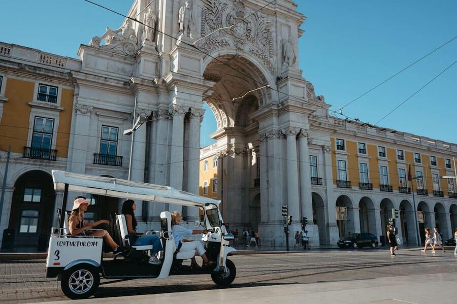Lisbon: Private Christmas Lights Tour by Eco Tuk Tuk - Winter comfort in an open-sided vehicle