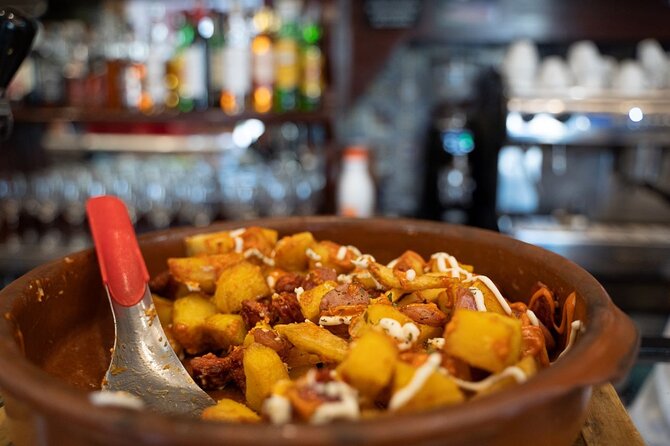 Madrid by Night: Tapas Crawl, Local Drinks & Hidden Gems - Finishing near Puerta del Sol with something sweet