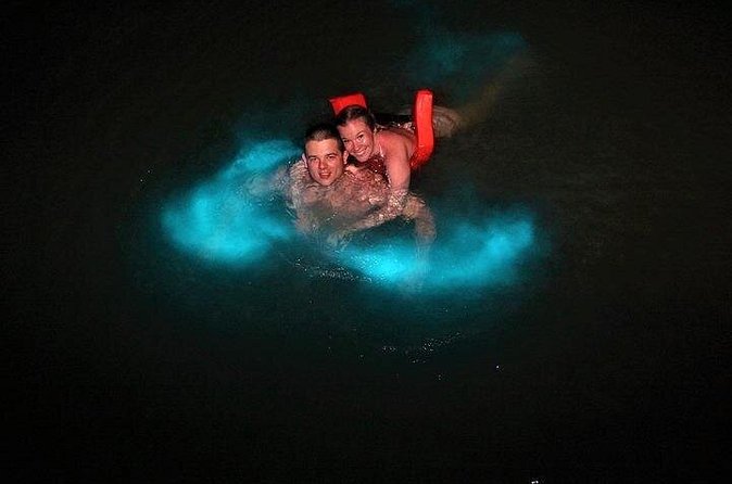 Mystic Luminescent Lagoon Night Cruise & Swim in Jamaica - Fire Shows, Limbo, and Added Entertainment