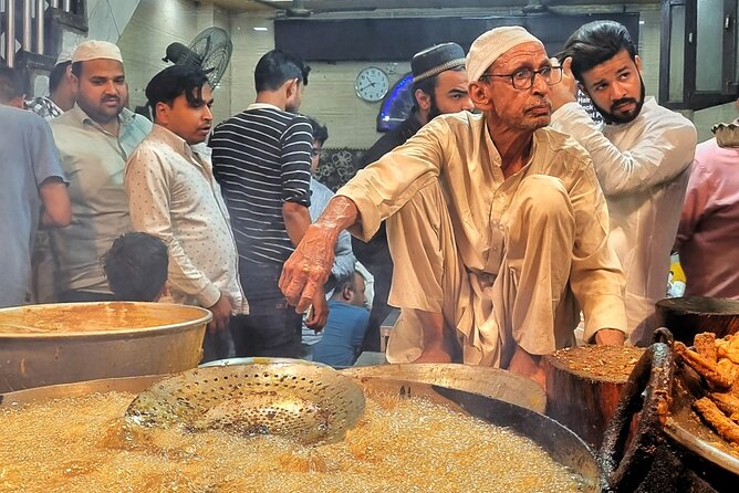Old Delhi Night Food Tour - Kitchens & Local Stories - Kalan Mehal and dinner under the mosque lights