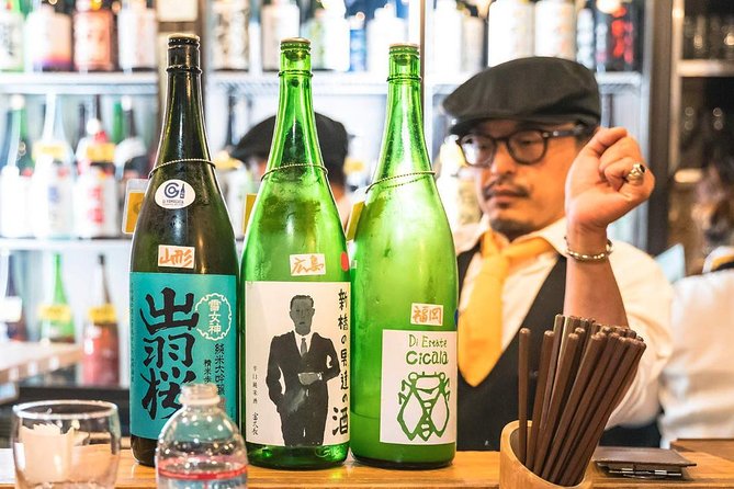 Osaka Backstreet Nightlife & Street Food Walking Tour - Dotonbori and the Glico sign: famous Osaka in a short burst