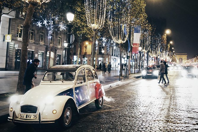 Paris and Montmartre 2CV Tour by Night with Champagne - The Eiffel Tower after the lights come on