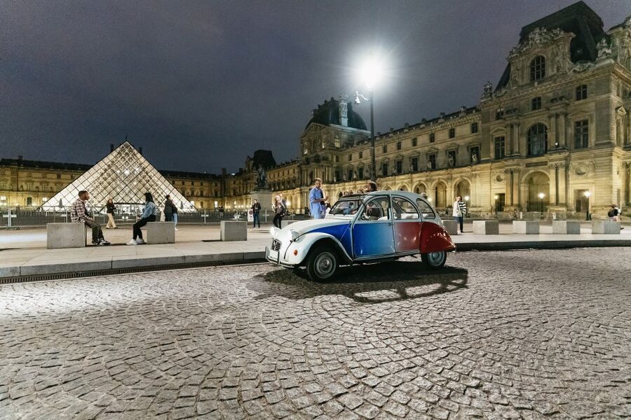 Paris: Discover Paris by Night in a Vintage Car with a Local - Champagne, comfort, and optional extras
