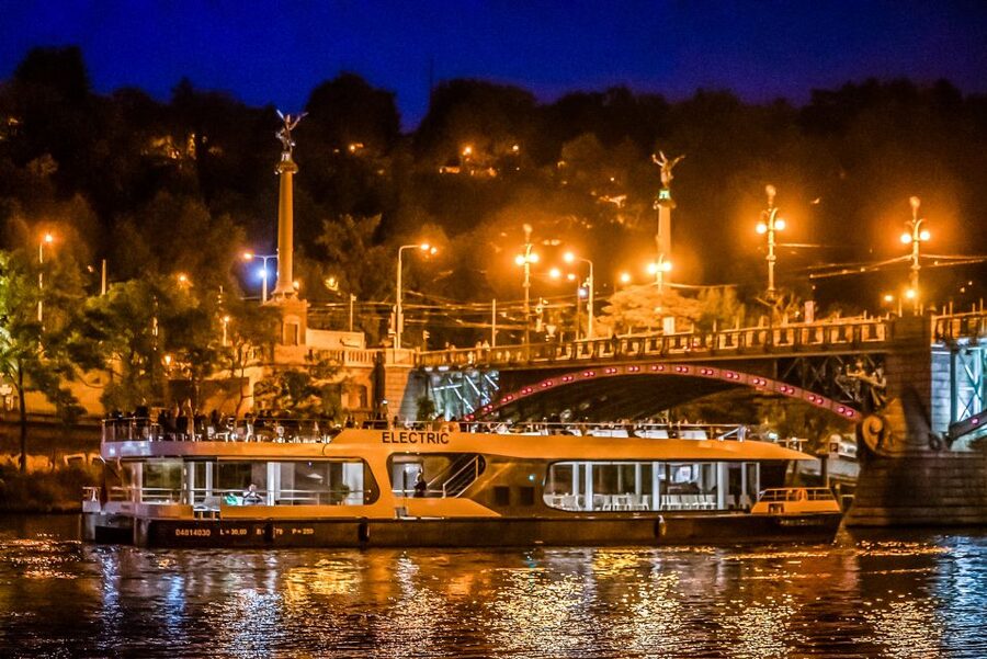 Prague: 50-Minute Sightseeing Evening Cruise - Audio commentary, guides, and onboard sound