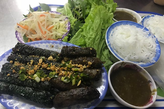 Private Saigon Night Food Tour by Scooter - Nguyen Thien Thuat and the ride through older Saigon