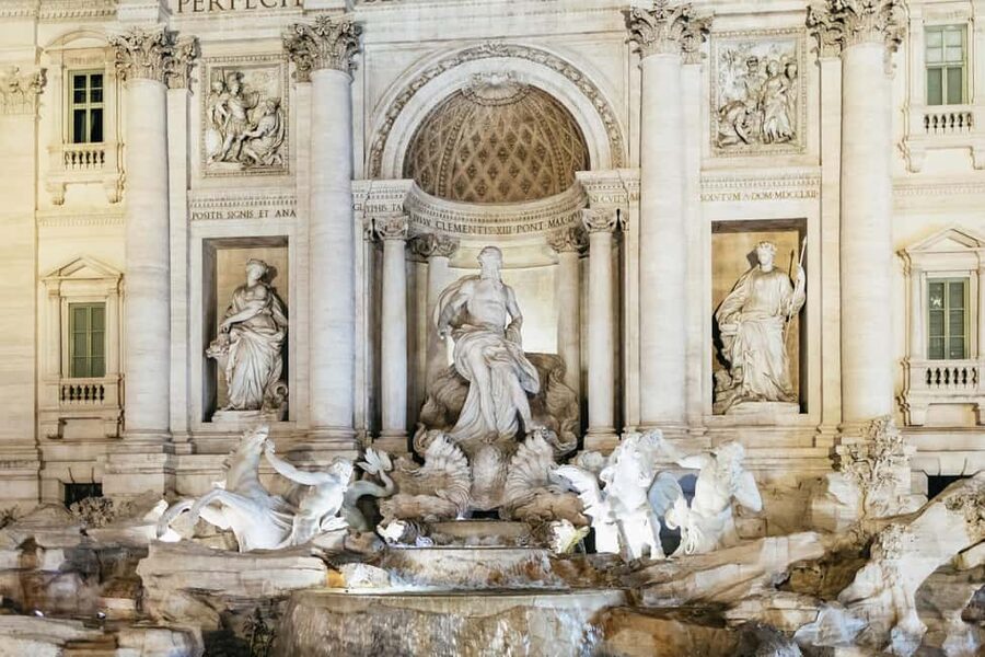 Rome: Small-Group City Highlights Moonlight Walking Tour - The Colosseum closes the walk under lights