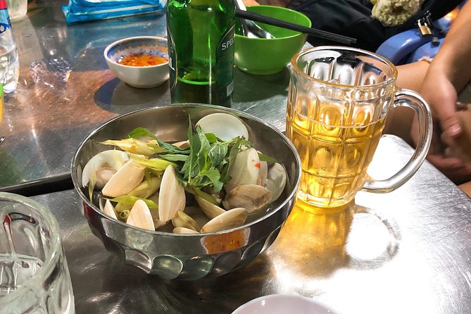 Saigon By Night and Street Food By Motorbike | Opt: Ao Dai Riders - 5:30 PM pickup and the first bowl of noodles