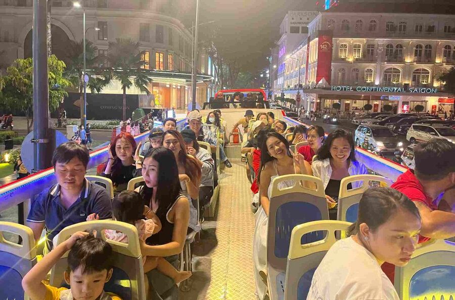 Saigon: City Sightseeing 45-Minute Panoramic Night Tour - Upper deck views, rain, and comfort