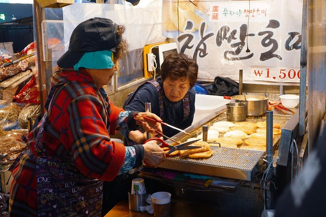 Seoul Street Food Market Tour - Cold weather, snow, and market comfort