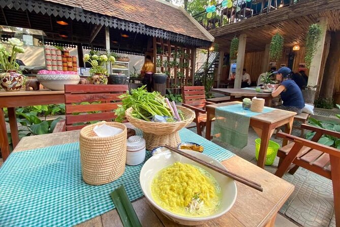 Siem Reap Evening Food Tour - Inclusive 5 stops Local Tastings - Stop three: herbs, spring rolls, tofu, fruit, and snails