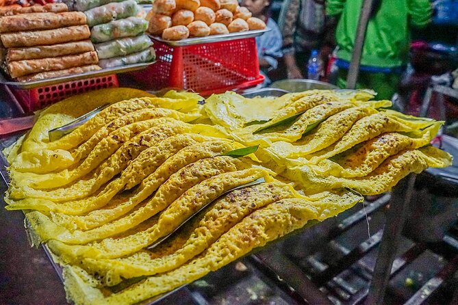 Siem Reap Evening Food Tour - Inclusive 5 stops Local Tastings - Stop five: beer, Long’s Bar, and the possible Sombai finale